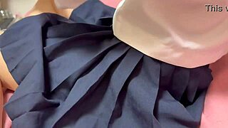 A beautiful woman in a schoolgirl uniform wears pantyhose and masturbates until she cums.